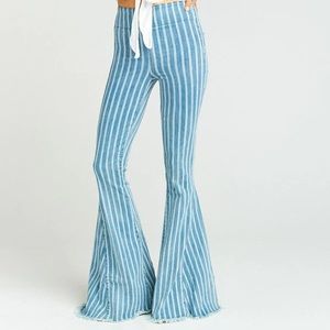 LIGHTLY WORN SHOW ME YOUR MUMU STRIPE FLARE JEANS.